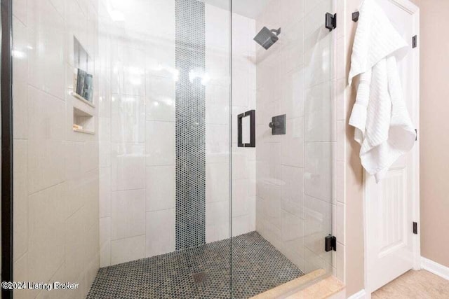 bathroom featuring walk in shower