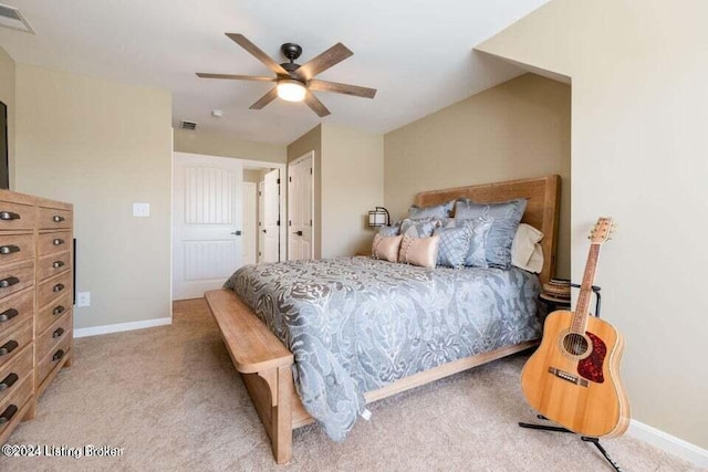 carpeted bedroom with ceiling fan