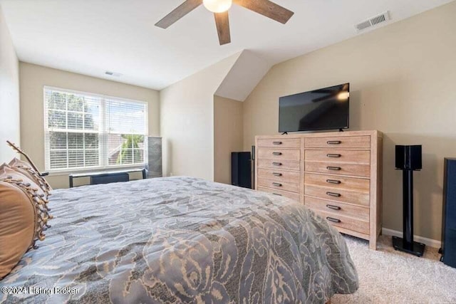 bedroom with light carpet, ceiling fan, and lofted ceiling