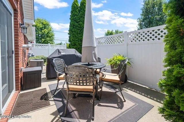 view of patio / terrace with a grill