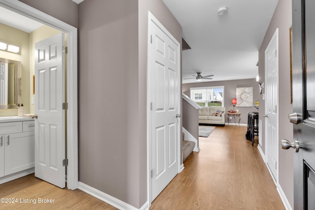 hallway featuring light wood-type flooring