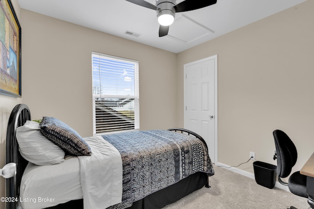 carpeted bedroom with ceiling fan