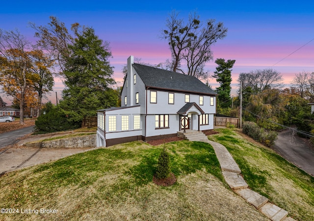 view of front of house featuring a yard