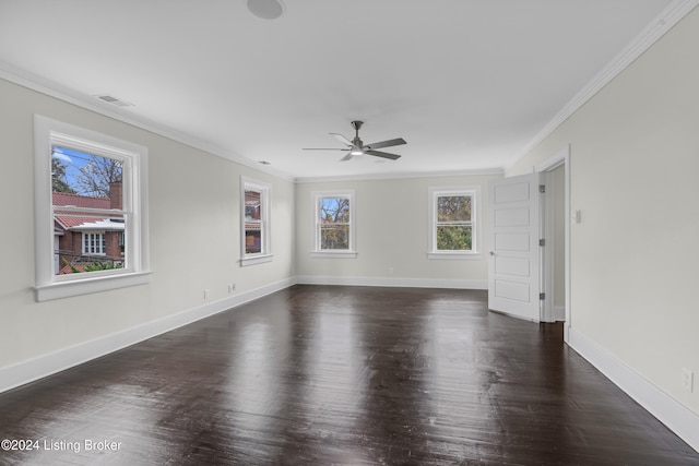 empty room with dark hardwood / wood-style floors, ceiling fan, and crown molding