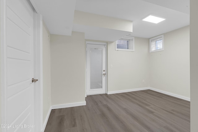 basement with wood-type flooring