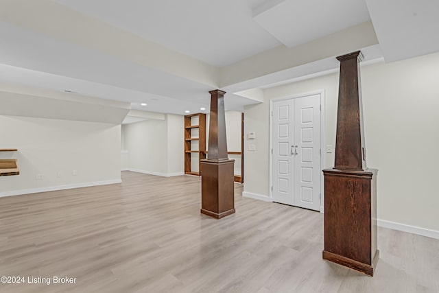 basement featuring light wood-type flooring