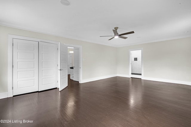 interior space with crown molding, ceiling fan, and dark hardwood / wood-style floors