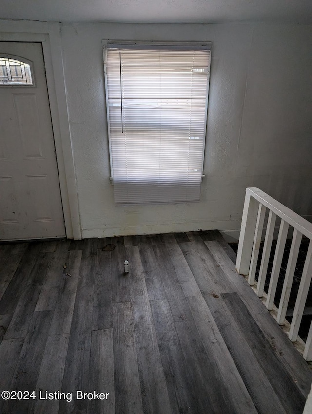 unfurnished room featuring wood-type flooring