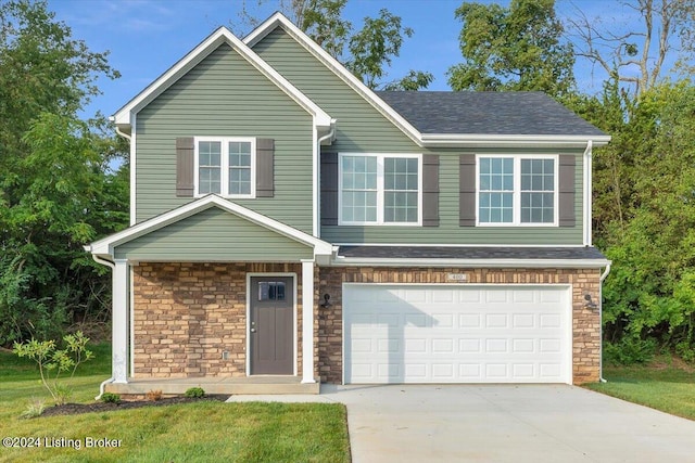 view of front of property with a garage