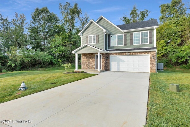 view of front of property featuring central AC, a front yard, and a garage