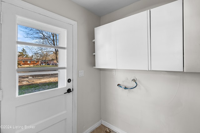 washroom featuring cabinets