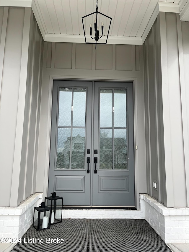 property entrance featuring french doors