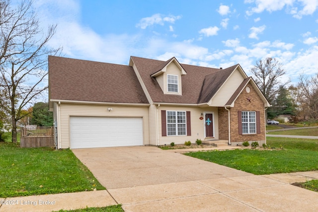 view of front facade with a garage and a front yard