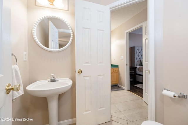 bathroom with tile patterned flooring