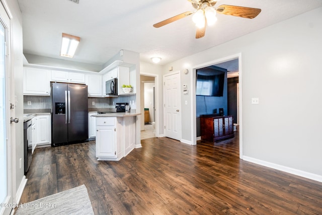 kitchen with tasteful backsplash, ceiling fan, dark wood-type flooring, black appliances, and white cabinetry