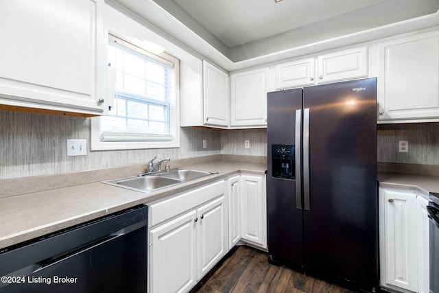 kitchen featuring sink, white cabinets, stainless steel appliances, and dark hardwood / wood-style floors