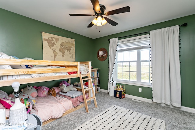 carpeted bedroom with ceiling fan