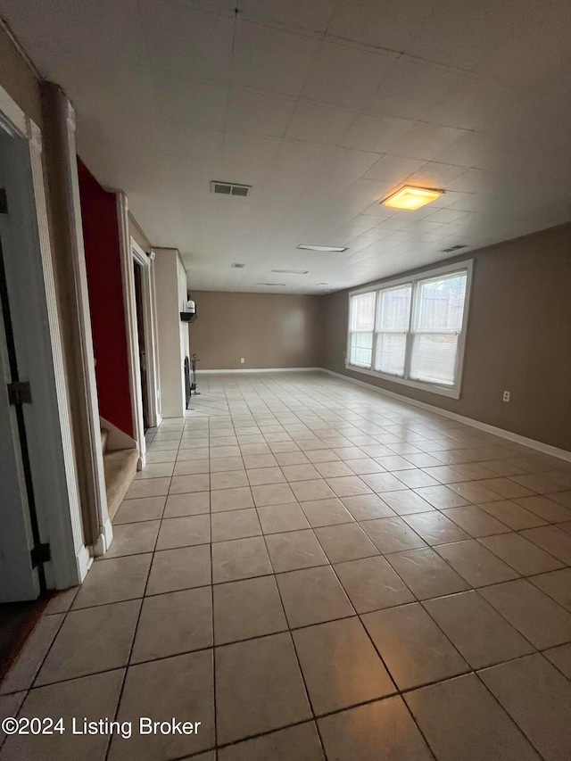 view of tiled spare room