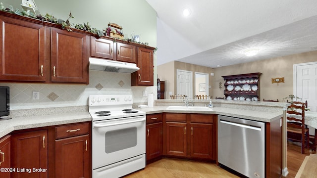 kitchen featuring kitchen peninsula, stainless steel dishwasher, white electric range oven, sink, and light hardwood / wood-style floors