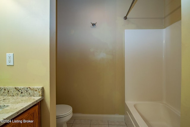 full bathroom with tile patterned flooring, vanity,  shower combination, and toilet