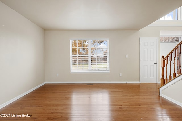 spare room featuring light hardwood / wood-style flooring