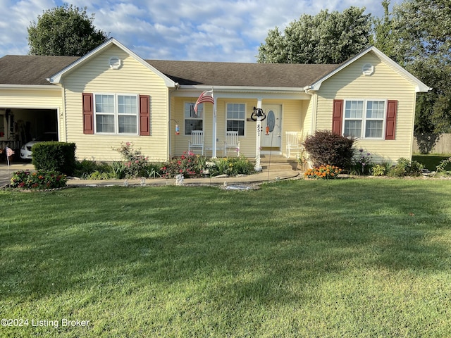 single story home featuring a porch, a garage, and a front lawn