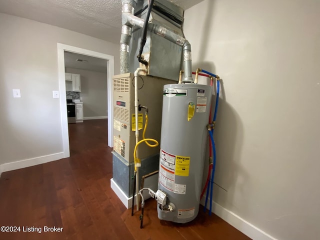 utility room featuring gas water heater