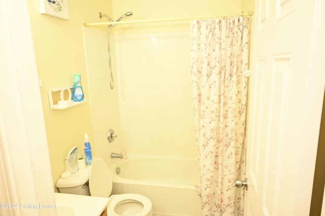 full bathroom featuring vanity, toilet, and shower / bathtub combination with curtain