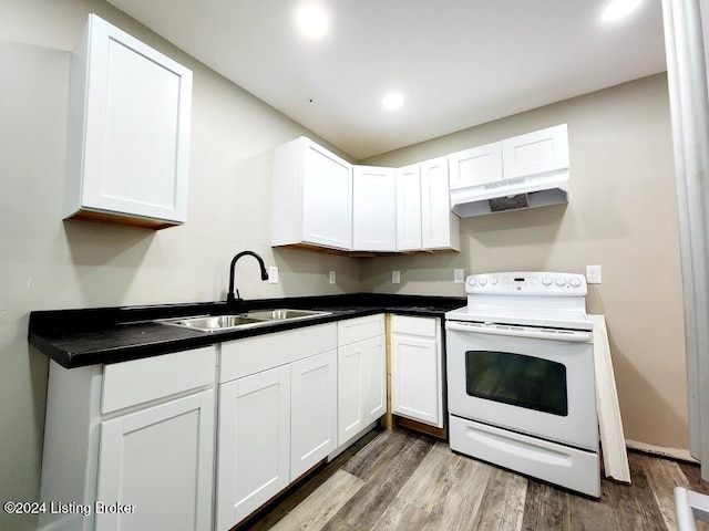 kitchen with white cabinetry, white electric stove, hardwood / wood-style flooring, and sink