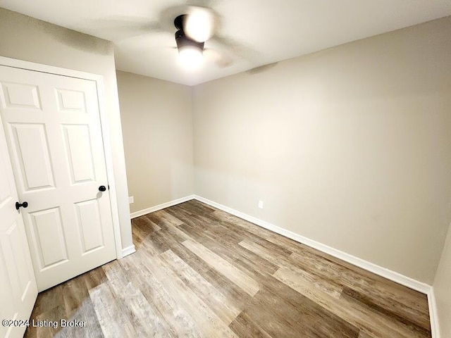 spare room with light hardwood / wood-style flooring