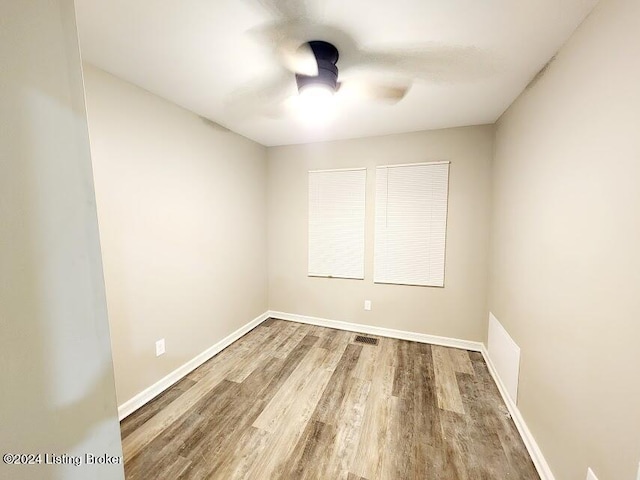 empty room featuring hardwood / wood-style floors