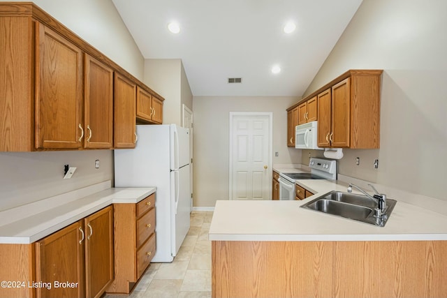 kitchen featuring kitchen peninsula, white appliances, sink, light tile patterned floors, and lofted ceiling