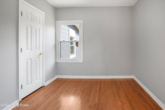 empty room featuring wood-type flooring