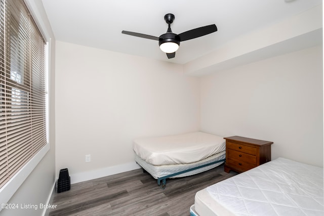 bedroom featuring hardwood / wood-style flooring and ceiling fan