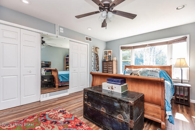 bedroom with hardwood / wood-style floors and ceiling fan