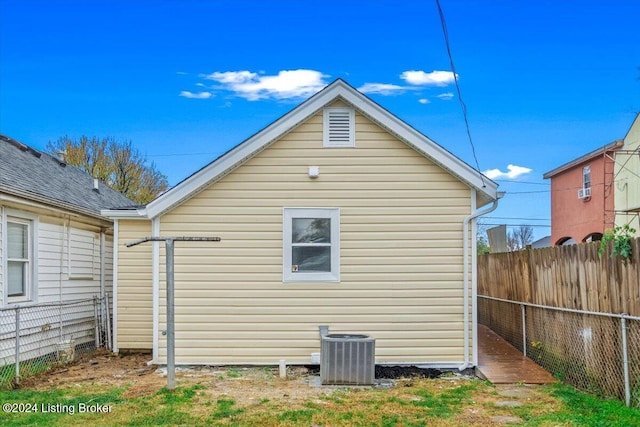 view of property exterior with central AC unit