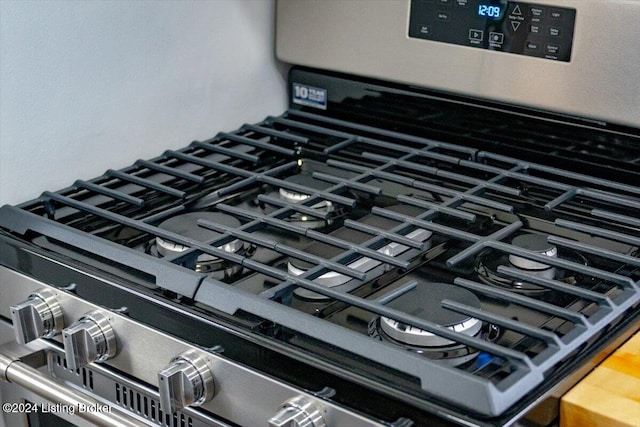 interior details featuring stainless steel gas range oven