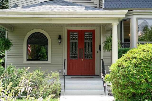 entrance to property featuring french doors