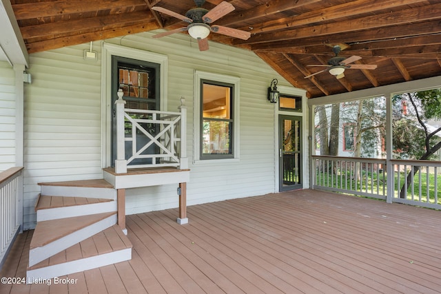 wooden deck featuring ceiling fan