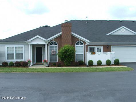 single story home with a garage