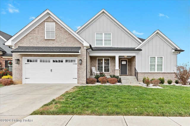 craftsman-style home with a garage and a front lawn