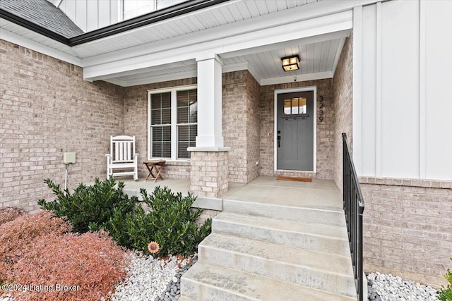 doorway to property with covered porch