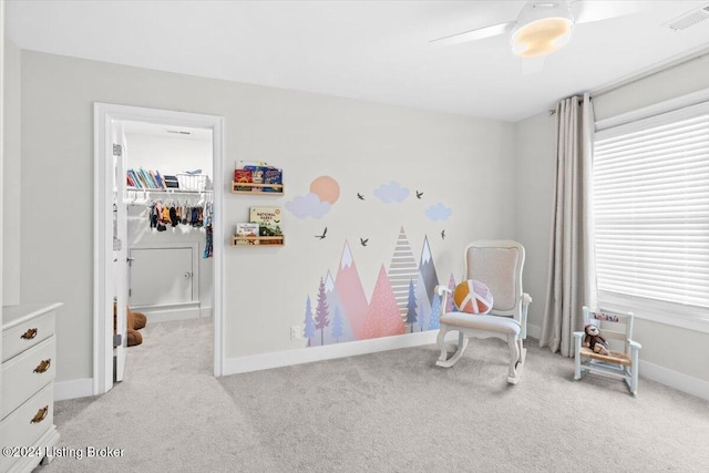 carpeted bedroom with ceiling fan