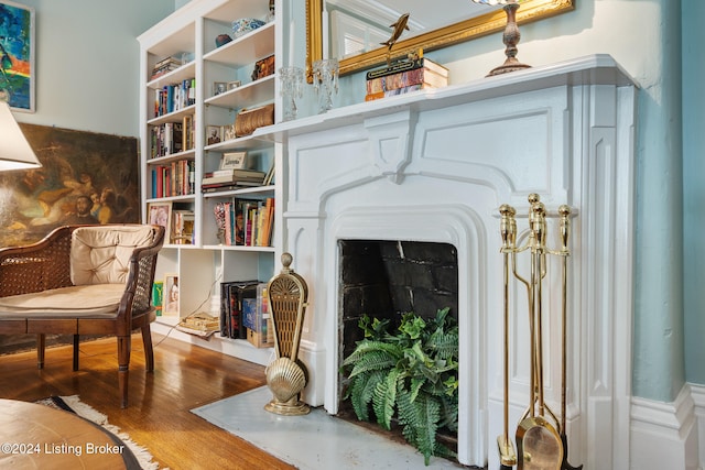 sitting room featuring wood-type flooring