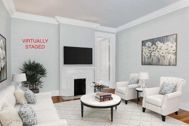 living room featuring light wood-type flooring and ornamental molding