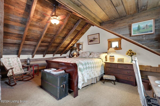 carpeted bedroom with lofted ceiling with beams, ceiling fan, and wood ceiling