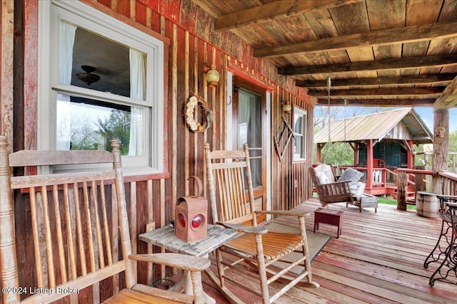 wooden terrace featuring a porch