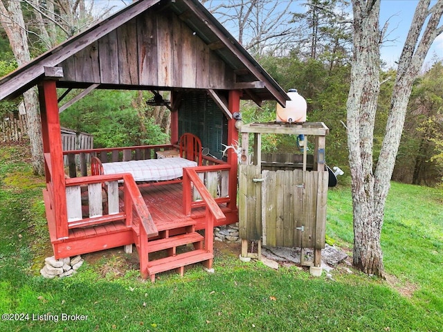 exterior space featuring a yard and a deck