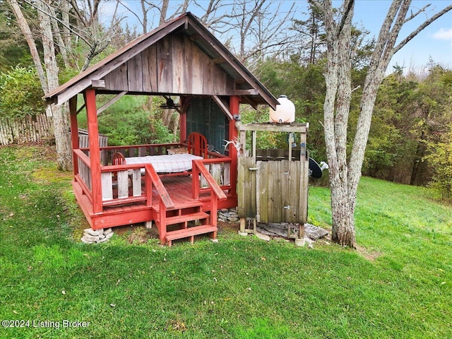 view of outbuilding with a lawn