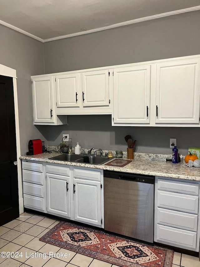 kitchen featuring white cabinetry, dishwasher, and light tile patterned flooring